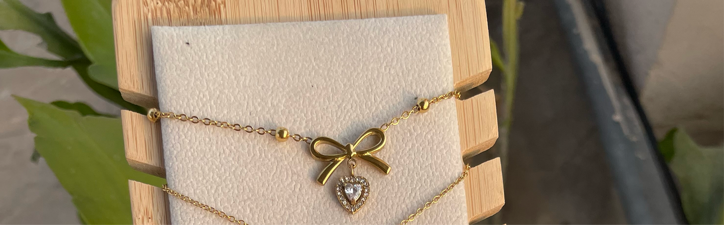 Golden heart bow chain